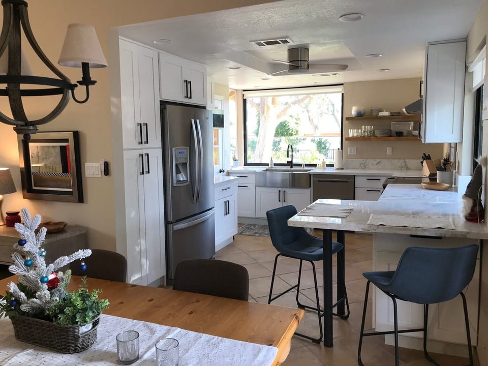 Dining Room, Full Kitchen and view to the pool