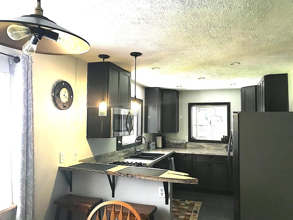 Breakfast Bar for two off of the kitchen, next to the dinning table. 
