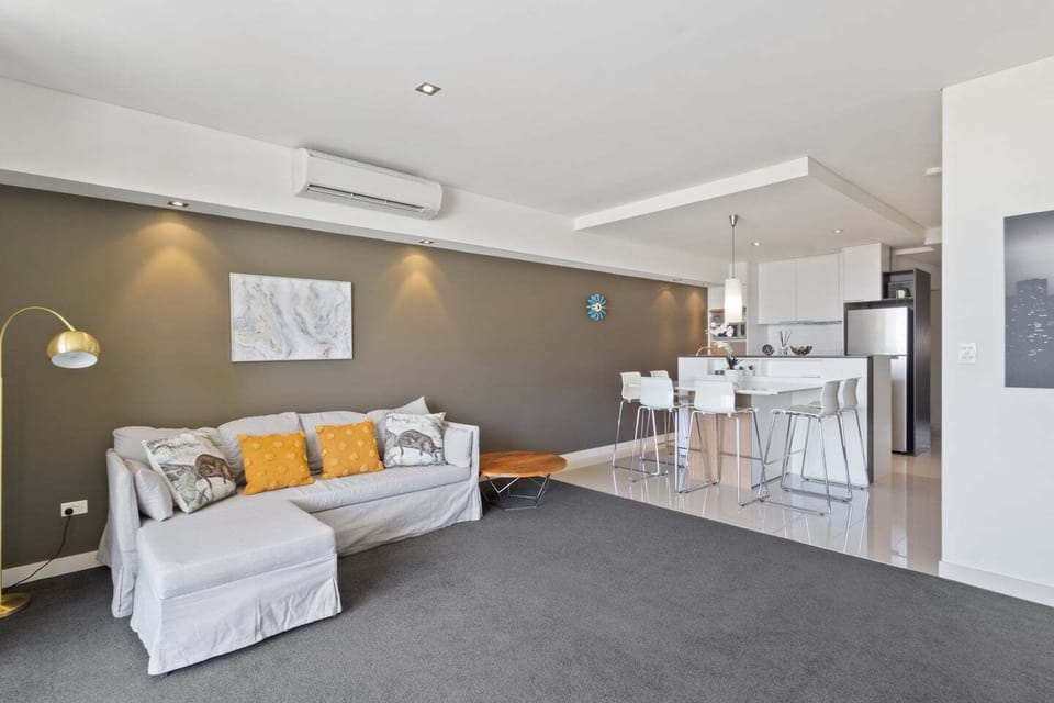 A warm and welcoming lounge with contemporary furnishings and soft, ambient lighting for relaxed evenings.