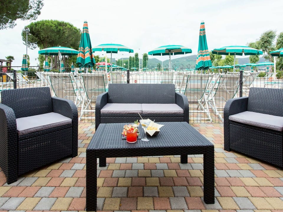 Furniture, Patio, Wicker, Property, Table, Room, Outdoor Table, Outdoor Furniture, Coffee Table, Leisure