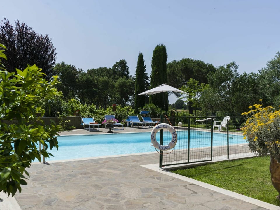 Water, Sky, Plant, Swimming Pool, Azure, Tree, Shade, Outdoor Furniture, Arecales, Building