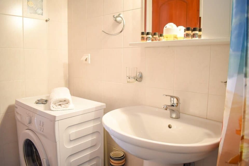 Clean and Spacious Bathroom with Amenities