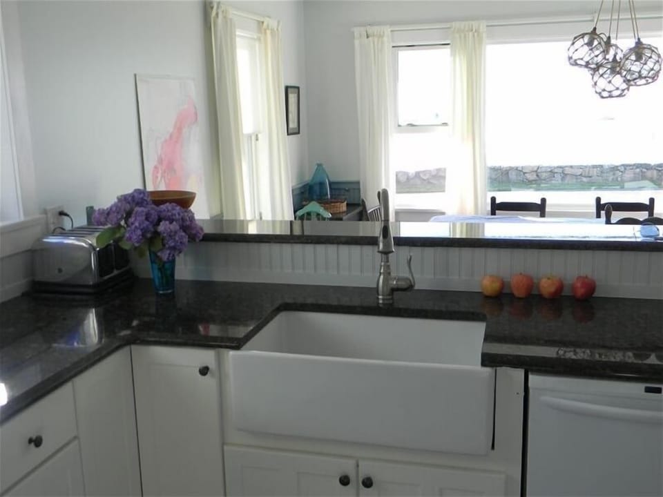 View from the kitchen through the dining room to the water.