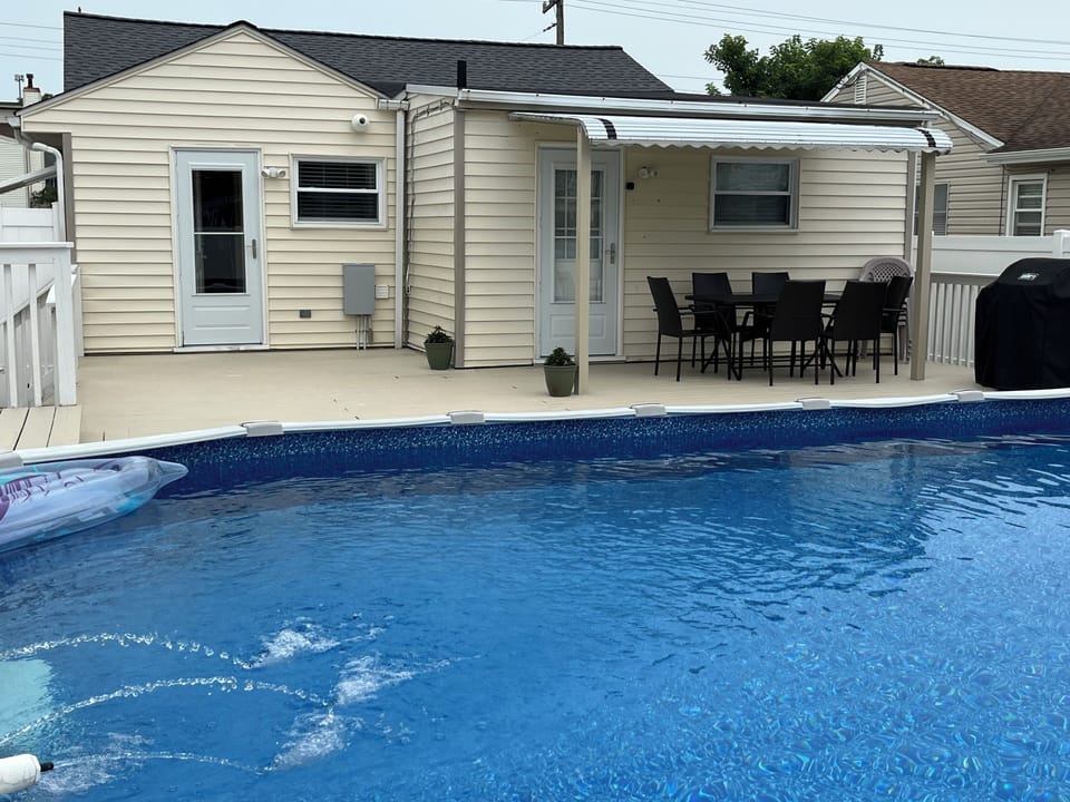 2 Back Doors that Lead to Pool and Deck