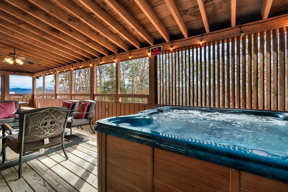 Screened outdoor seating, picnic table, & hot tub (off Dining & Pinecone rooms)