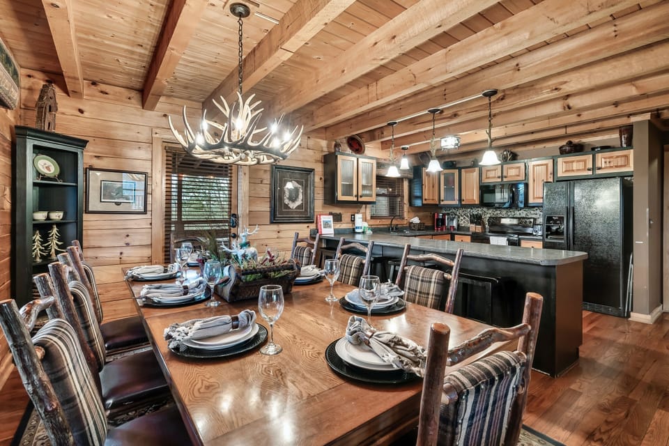 Door leads to BBQ, screened porch for added dining options, and hot tub