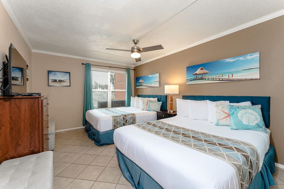 Our single bedroom has two beds, ideal for a small family or group of friends. Come enjoy an incredible island vacation on South Padre Island!