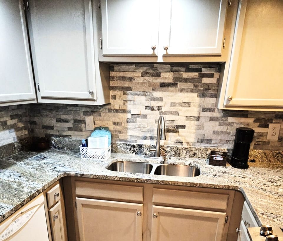 Fully Stocked & Ready – This stylish kitchen has everything you need to cook, clean, and unwind with ease.