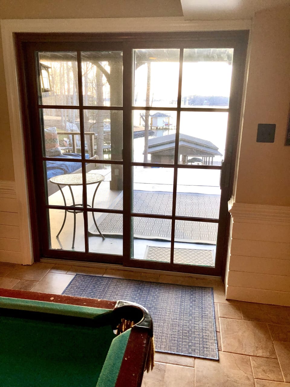 Walkout to lower patio through sliding doors of lower level den/game room.