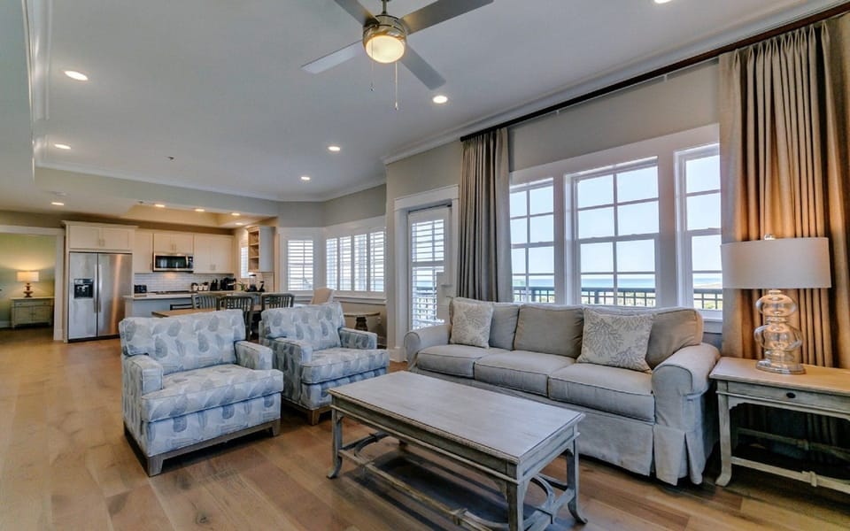 Find peace and relaxation with your close friends and family in this stunning living room featuring natural decor.