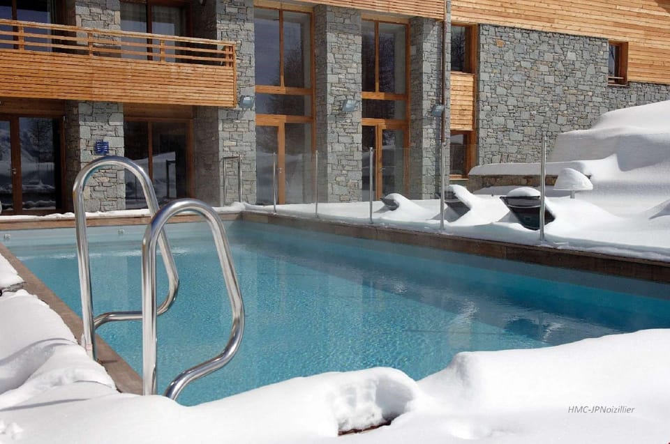 Take a dip in the fantastic outdoor swimming pool.