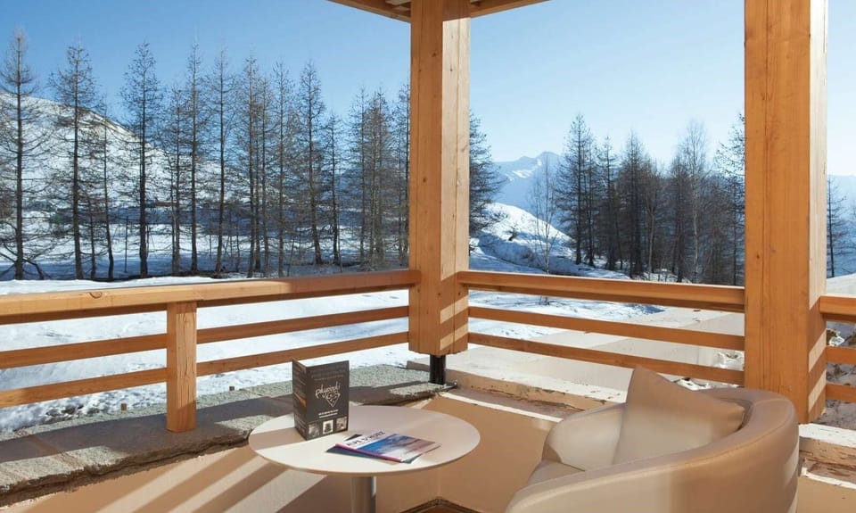 Take a seat outside and soak in the great mountain views.