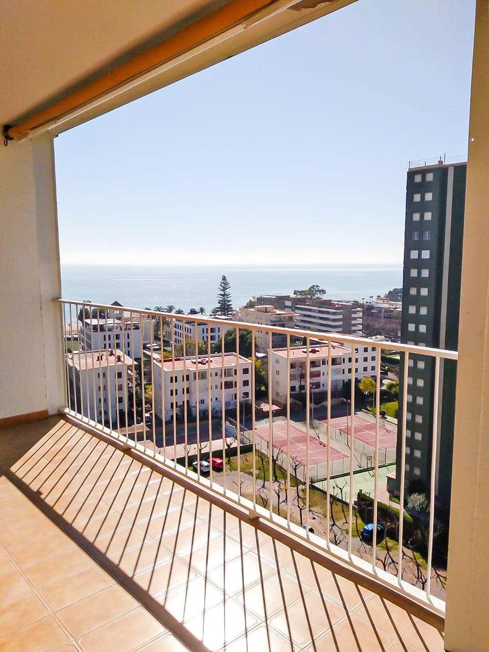 Terrace with sea and mountain views