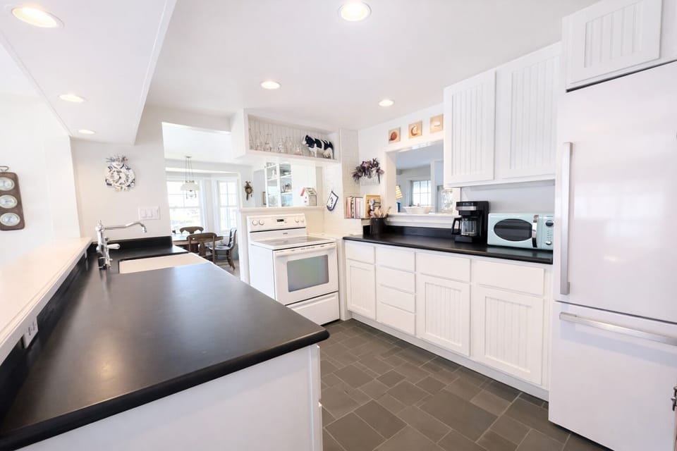 Alternate view of kitchen.