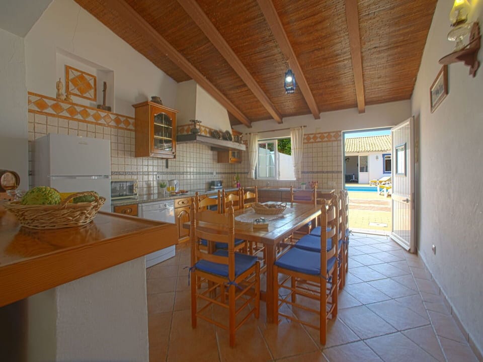 Table, Furniture, Cabinetry, Countertop, Wood, Kitchen, Interior Design, Architecture, Window, Floor