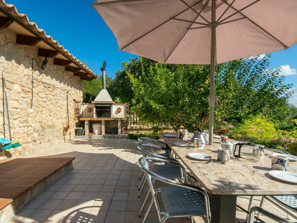Sky, Table, Furniture, Property, Flowerpot, Plant, Shade, Chair, Outdoor Table, Outdoor Furniture