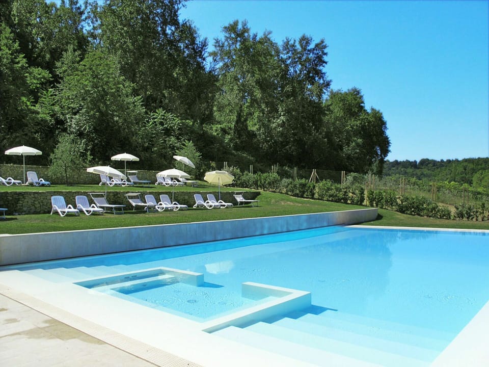 Water, Sky, Plant, Swimming Pool, Azure, Building, Shade, Rectangle, Tree, Grass