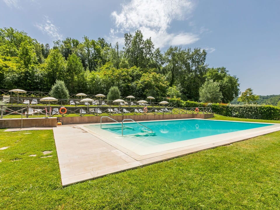 Furniture, Property, Ceiling Fan, Cabinetry, Table, Couch, Lighting, Picture Frame, Wood, Countertop