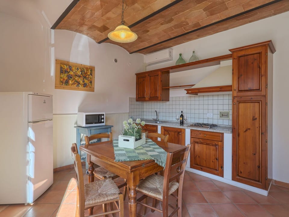 Furniture, Cabinetry, Property, Table, Countertop, Chair, Wood, Interior Design, Houseplant, Kitchen