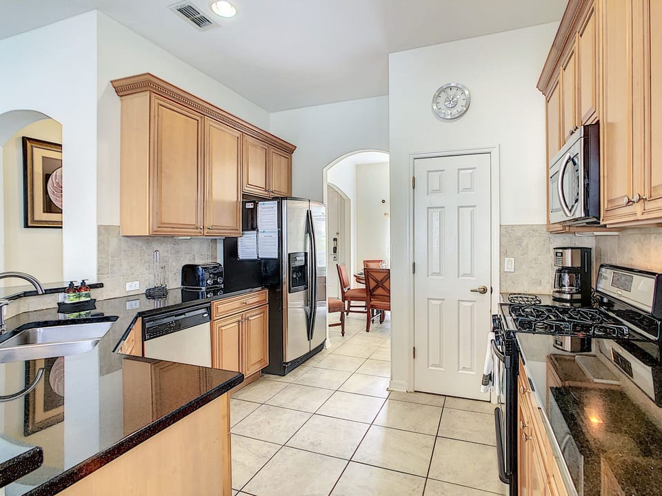 Walk in pantry - refrigerator has ice maker and water dispenser.