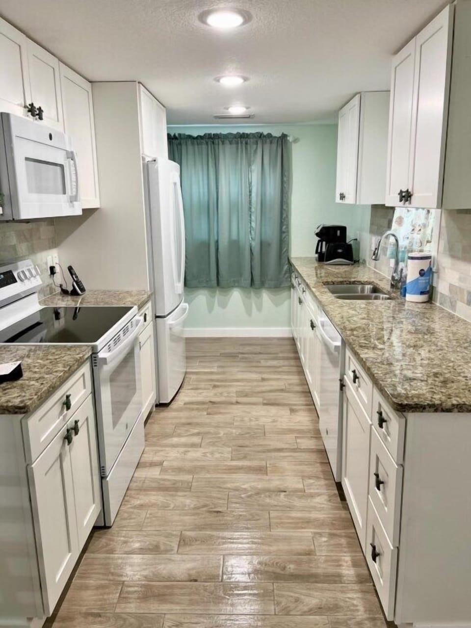Full kitchen with robust cooking supplies