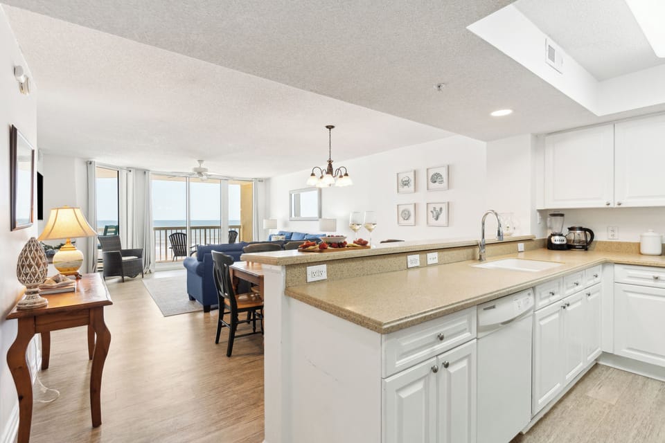 View of the open concept kitchen, living and dining space.