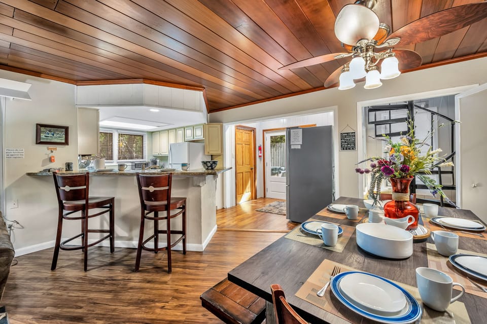 Kitchen area in main room. View to outside and hot tub. 
