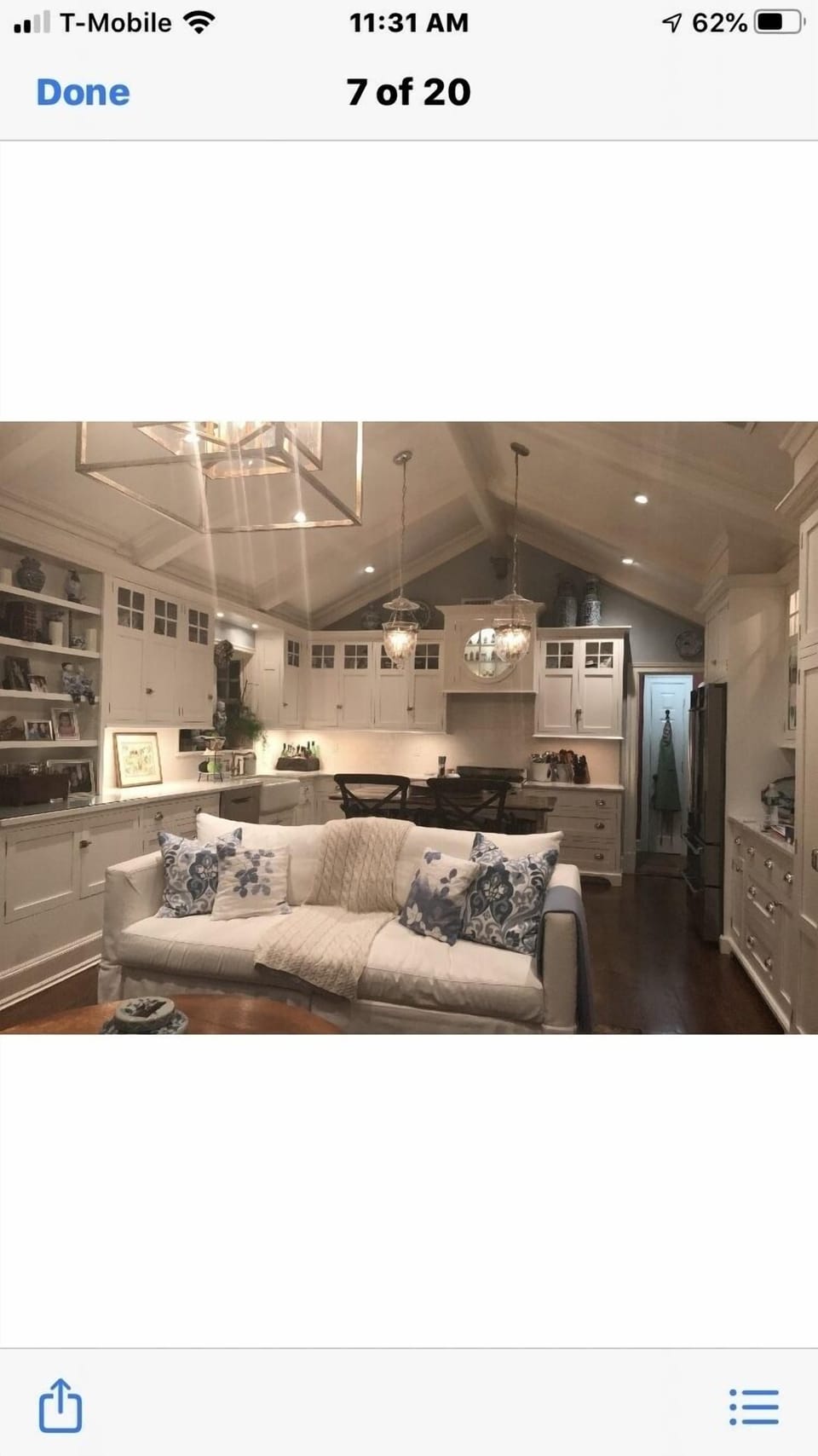 Family room with TV and kitchen