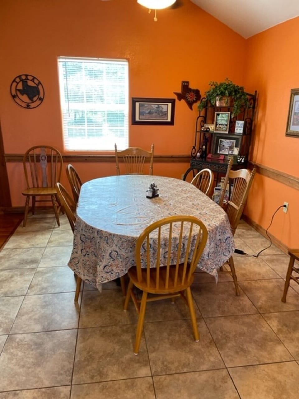 Dining seating for eight; the bar in the kitchen seats three. 
