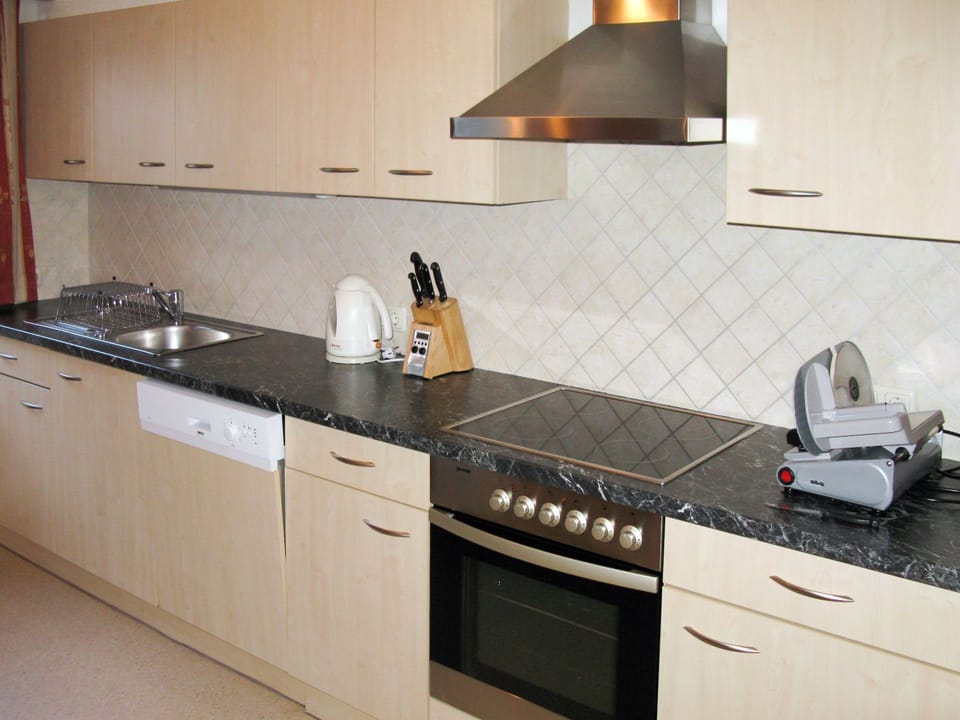 Countertop, Kitchen, Property, Room, Cabinetry, Kitchen Stove, Furniture, Gas Stove, Major Appliance, Kitchen Appliance
