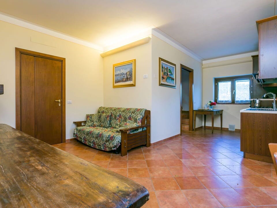 Furniture, Comfort, Wood, Couch, Building, Flooring, Table, Floor, Picture Frame, Door