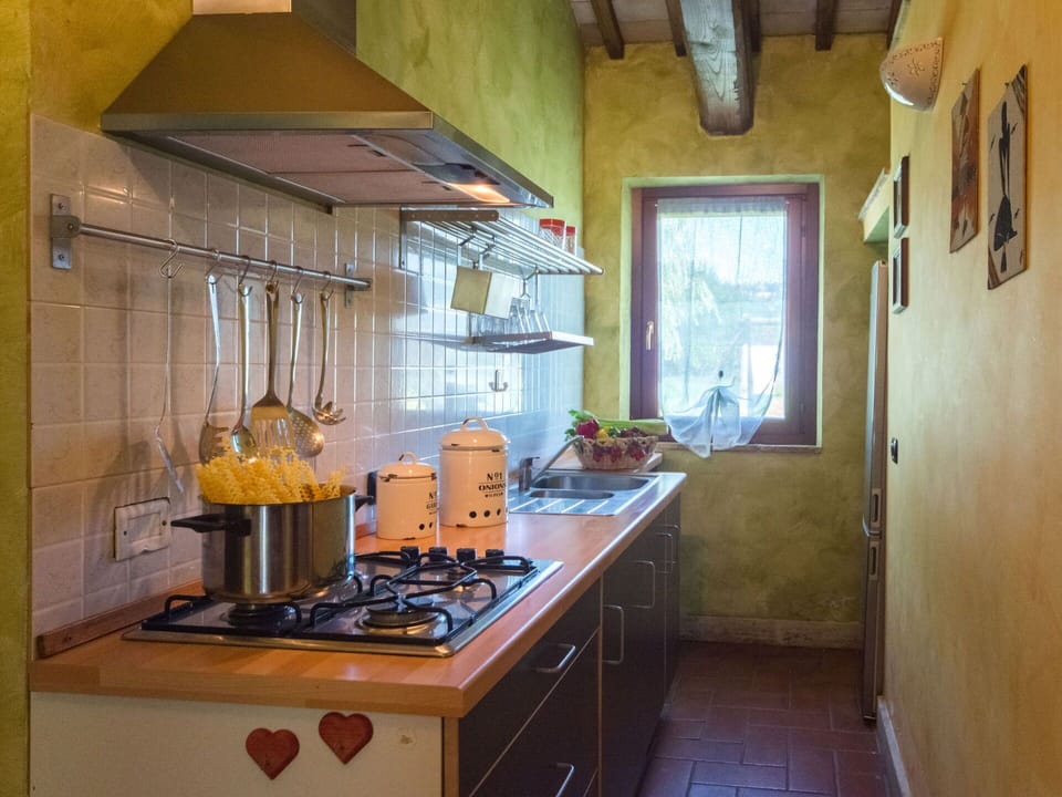 Room, Property, Yellow, Kitchen, Building, House, Interior Design, Ceiling, Furniture, Architecture