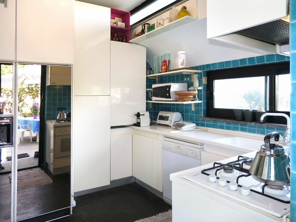 Room, Property, Countertop, Furniture, Interior Design, Kitchen, Building, Cabinetry, House, Turquoise
