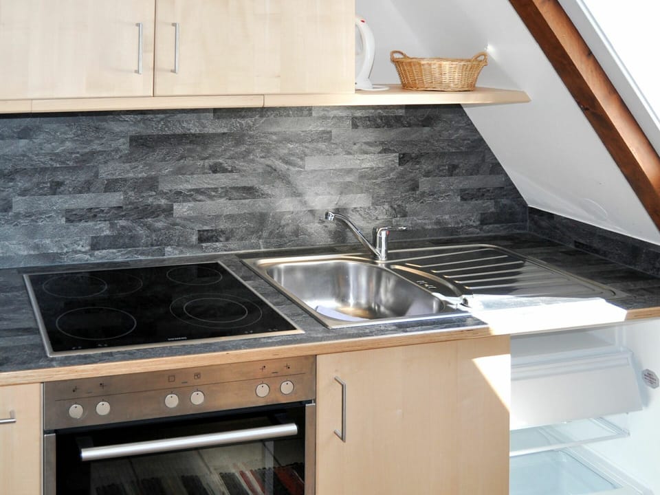 Cabinetry, Countertop, Property, Kitchen Sink, White, Kitchen Appliance, Cooktop, Kitchen Stove, Gas Stove, Home Appliance