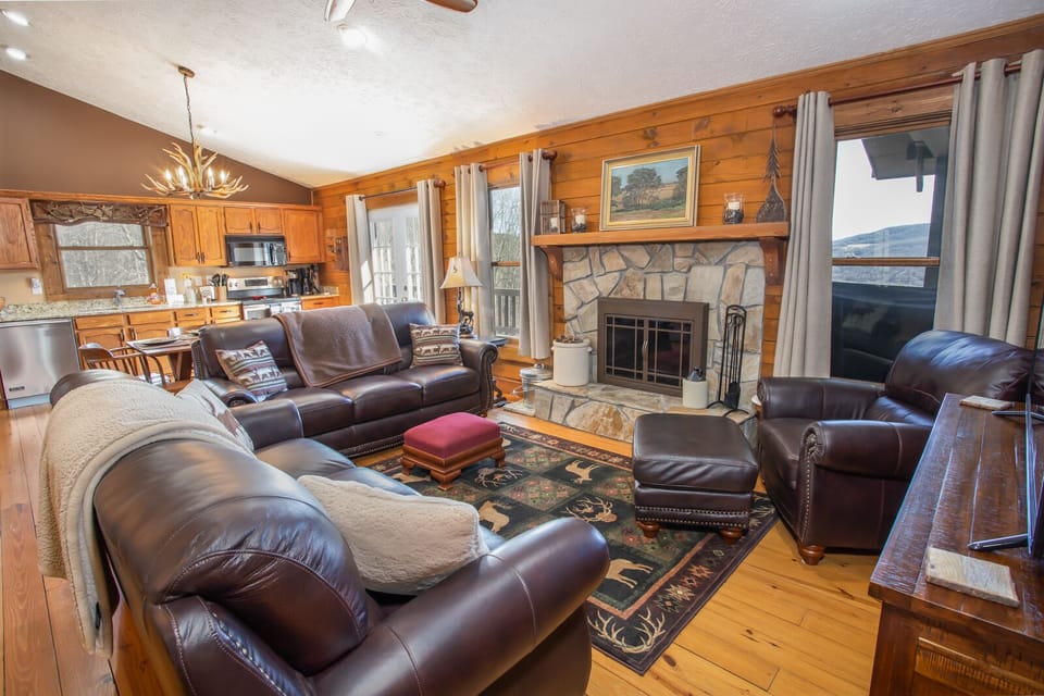 Open Living, Dining, and Kitchen on Main Level - all of which face Long Range Layered Views