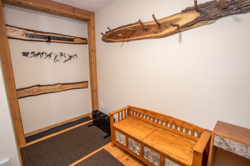 Mud Room at Front Entry with Custom Live Edge Coat Rack and Ski Rack
