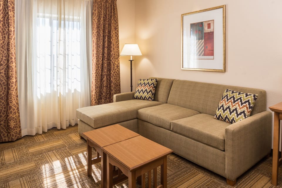 Sink into the cozy sofa after a day exploring the area.