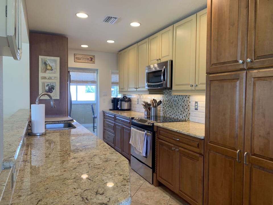 Kitchen located upstairs with views of Lemon Bay