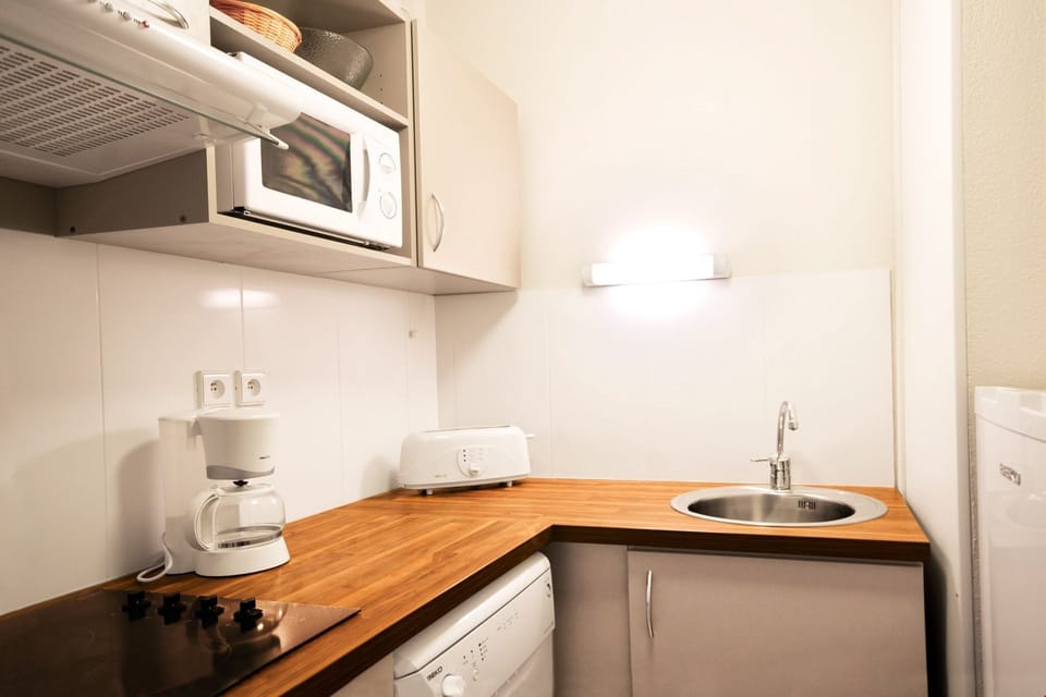 Prepare snacks in the kitchenette.