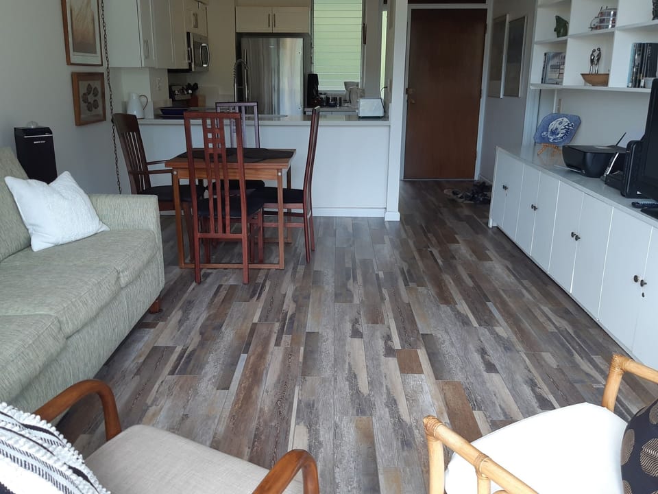 Lovely new flooring, sofa is a pull out double sofa bed with  excellent matress