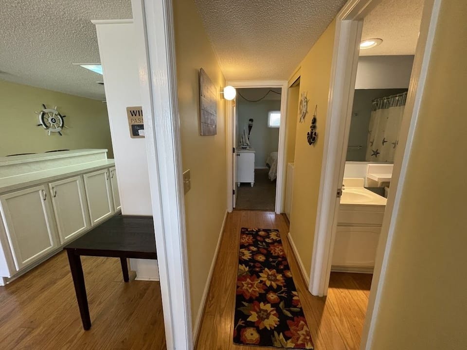 Hall between bedrooms has Washer/Dryer and bath 2 access