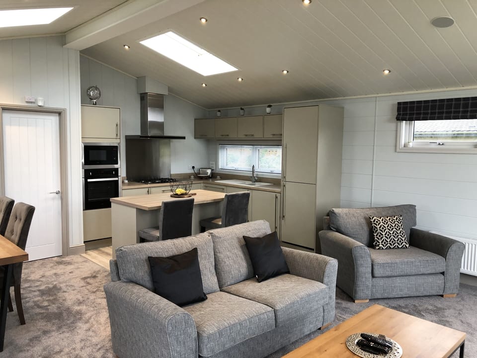 Living room with kitchen beyond