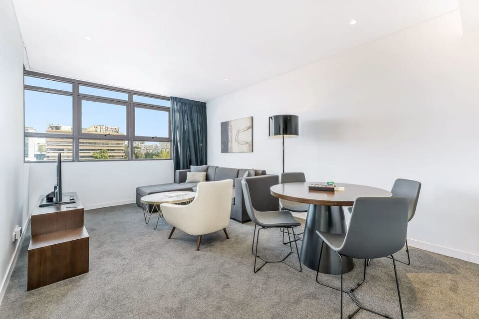 dining table,sofa and tv in the living room