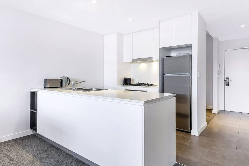 kitchen with fridge,oven and dish washing