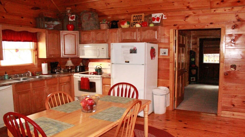 Kitchen and dining area.  Full of country charm and antiques!