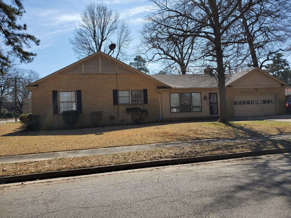 Side of house with a 2 car garage 
