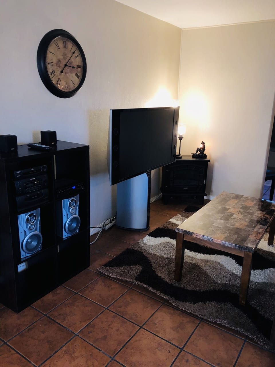 Completely professionally decorated living room .