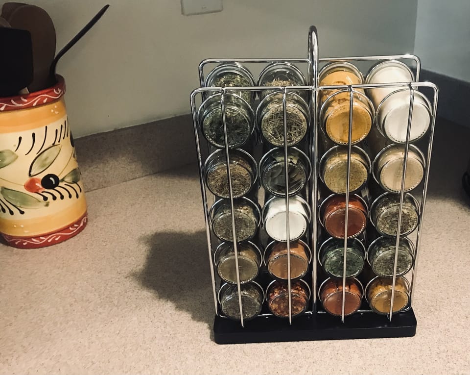 spices and condiments and lots of kitchen tools