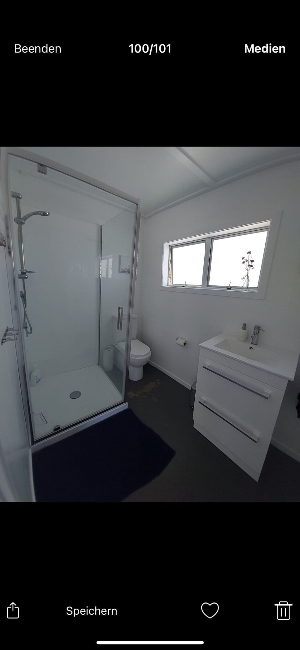 Bathroom with shower and toilet.