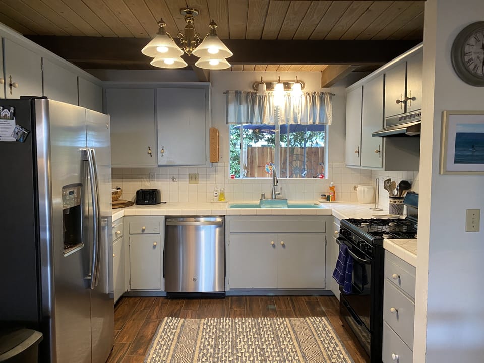Kitchen has a new Refrigerator & Dishwasher plus all other necessary items.